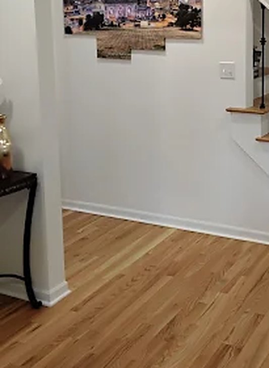 The entry, with a console table and the hallway beyond