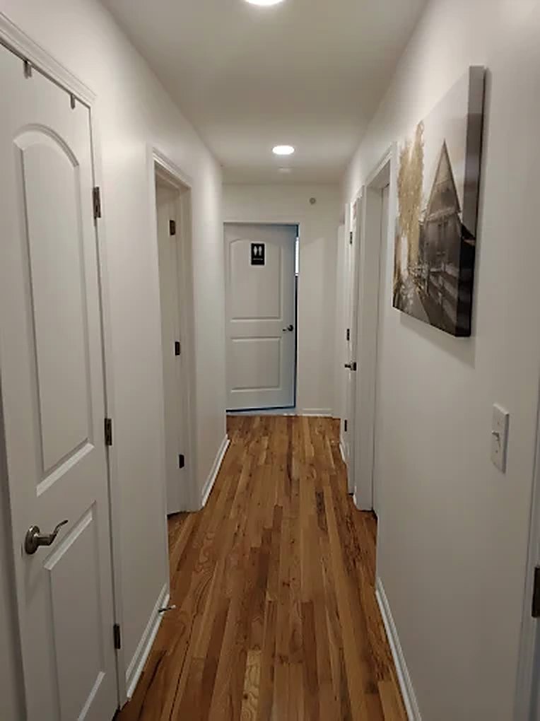 Home The hallway connecting the resident bedrooms